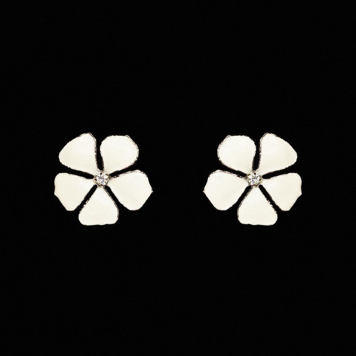 White enamel five-petal flower stud earrings with a small crystal centre