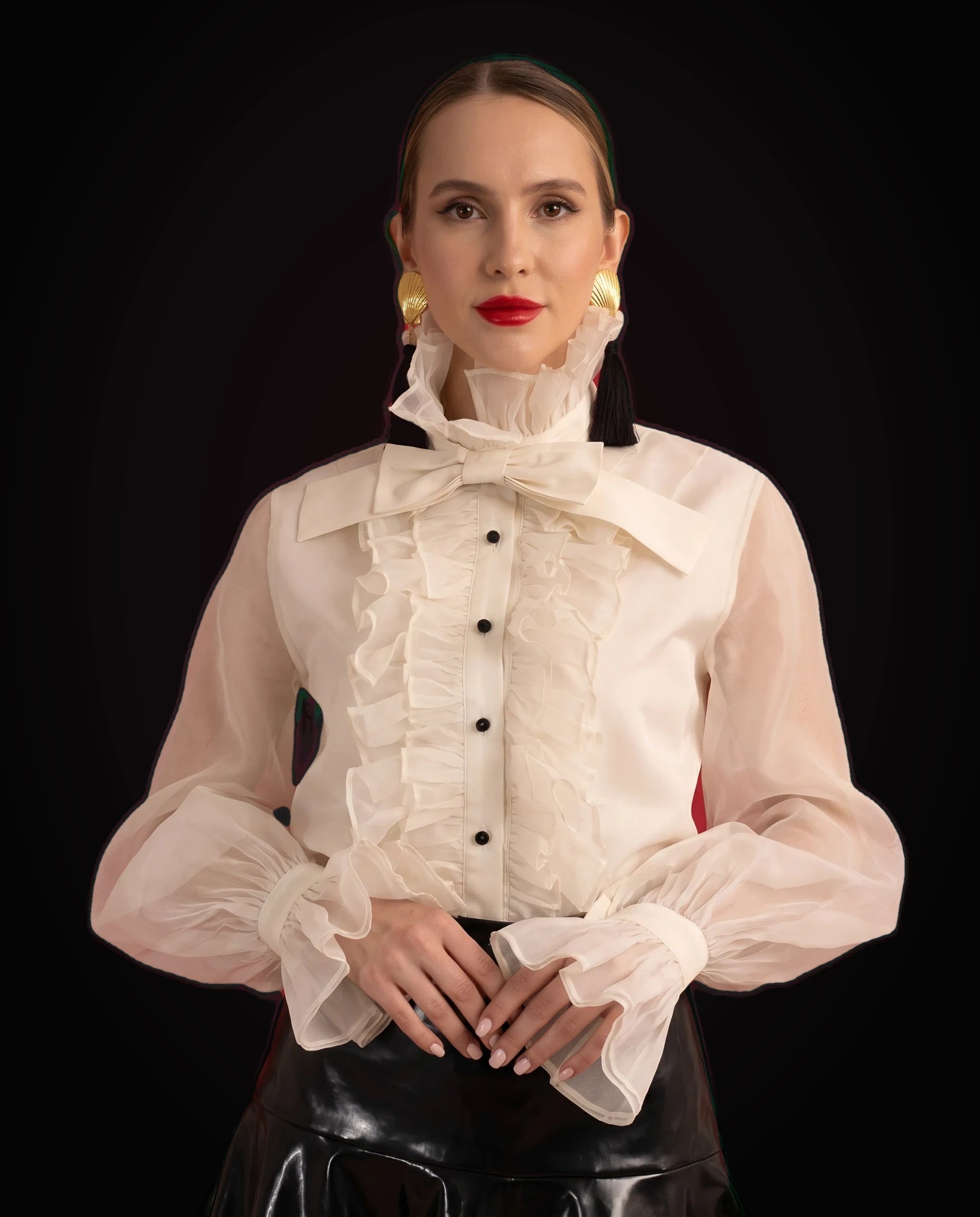 Ivory organza ruffled blouse with black patent flared mini skirt, blouse detail