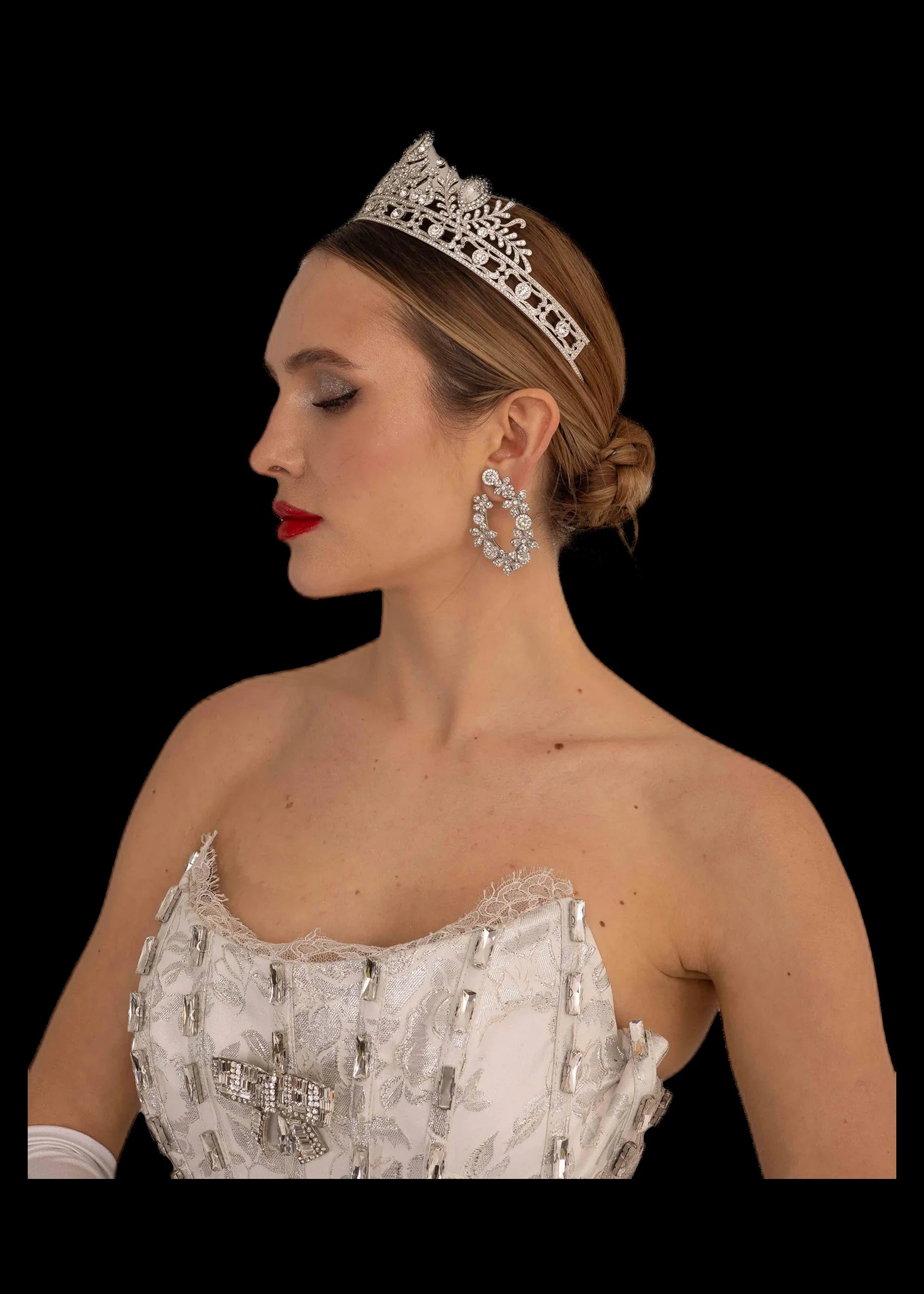 Ivory and silver brocade bridal ball gown with crystal-boned corset bodice, bodice and tiara, profile