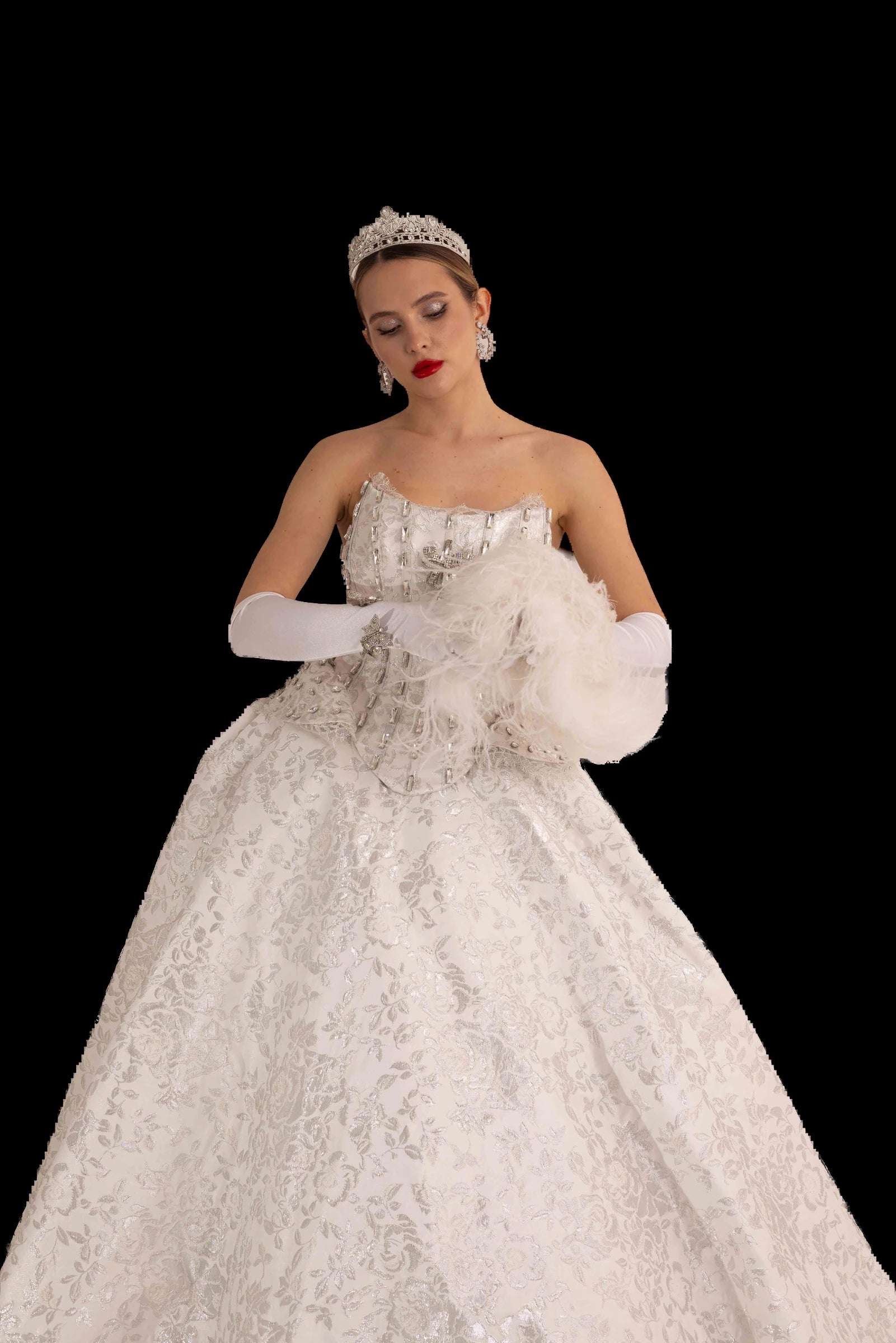 Ivory and silver brocade bridal ball gown with crystal-boned corset bodice, three-quarter view with feather muff