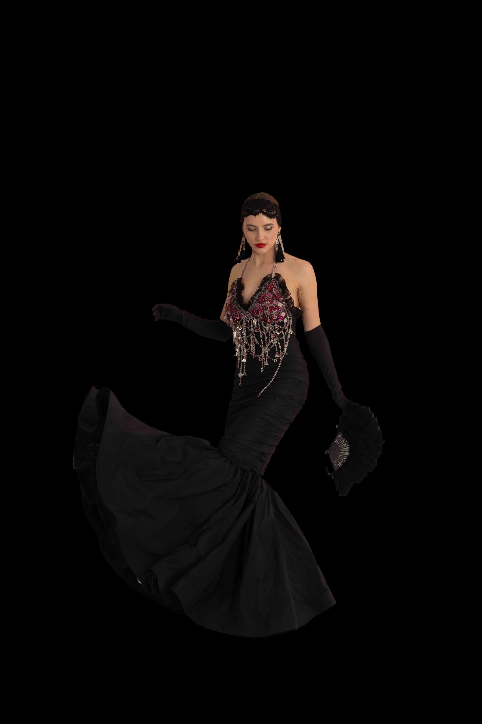 Black silk mermaid gown with crystal and fuchsia jewelled halter bodice, movement, skirt in motion