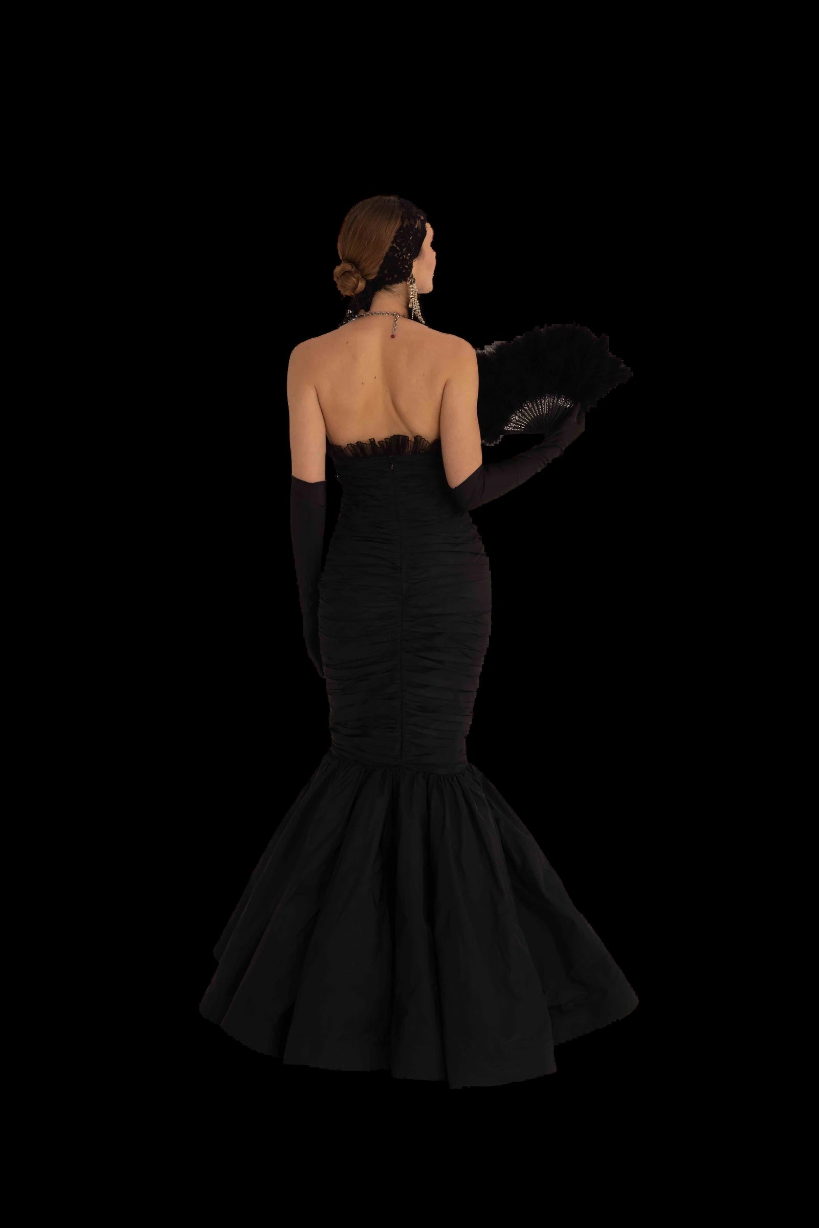 Black silk mermaid gown with crystal and fuchsia jewelled halter bodice, back view