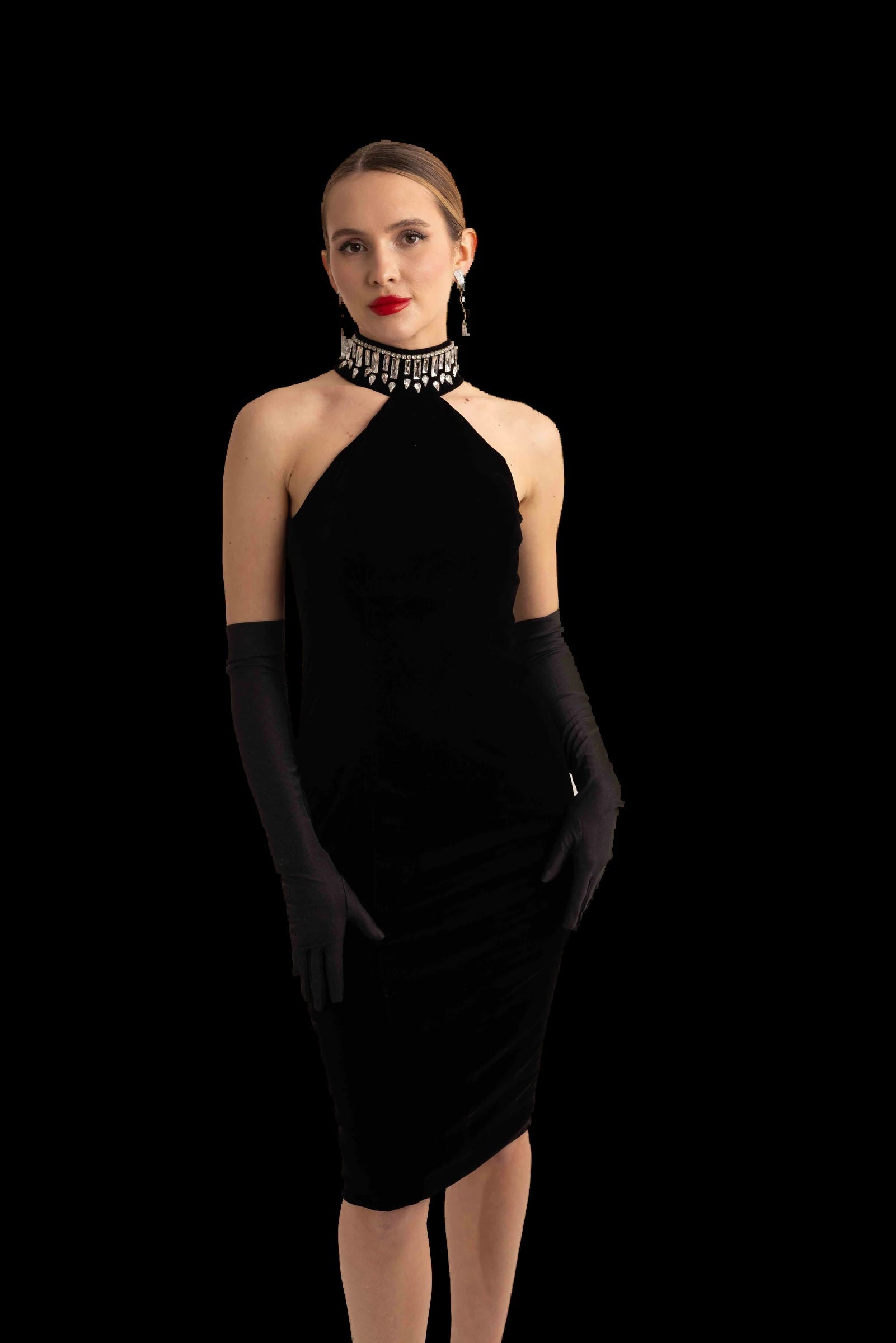 Black velvet halter midi dress, three-quarter view