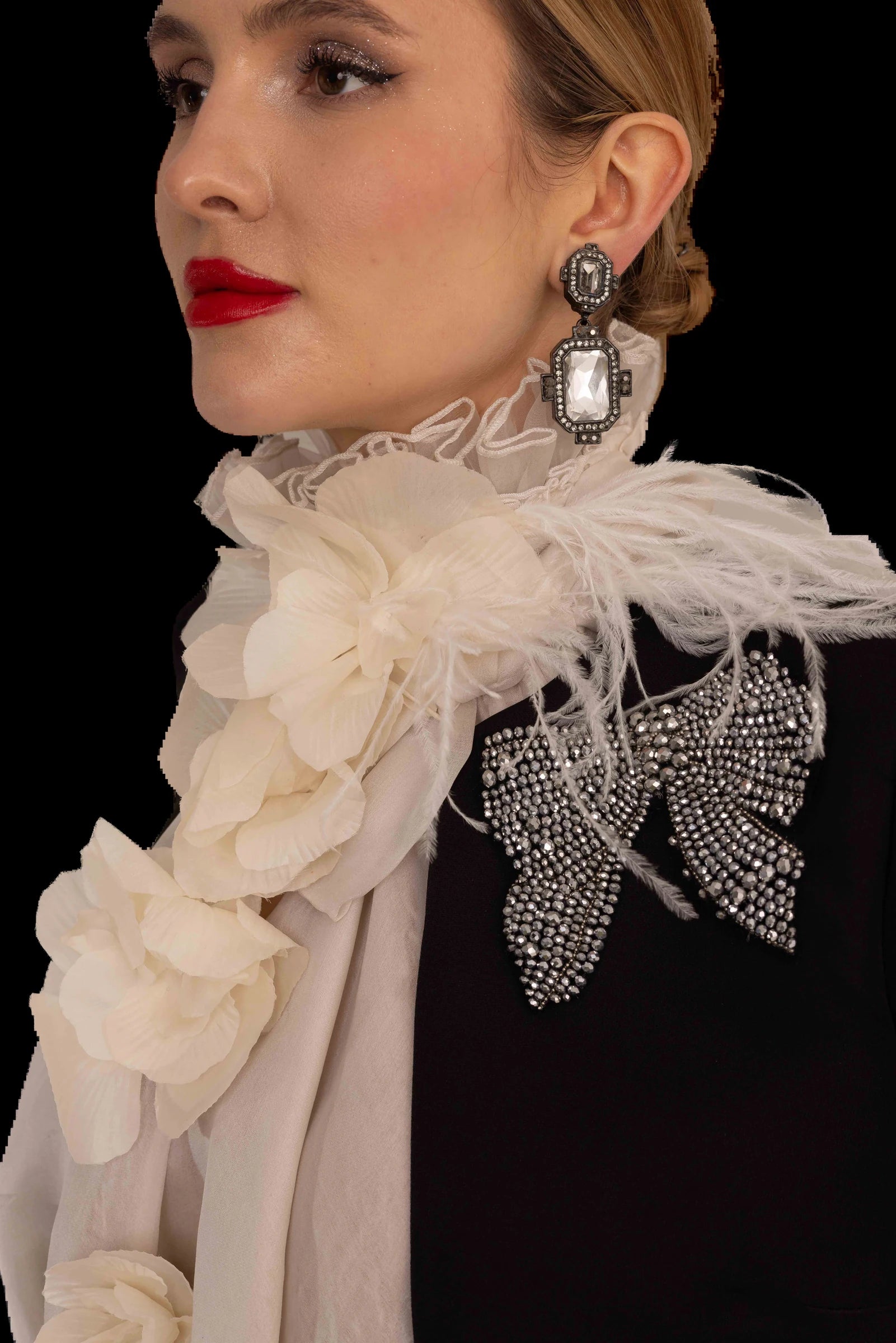 Black cropped jacket, ivory organza rosette blouse and flared black trousers, crystal bow and rosette detail