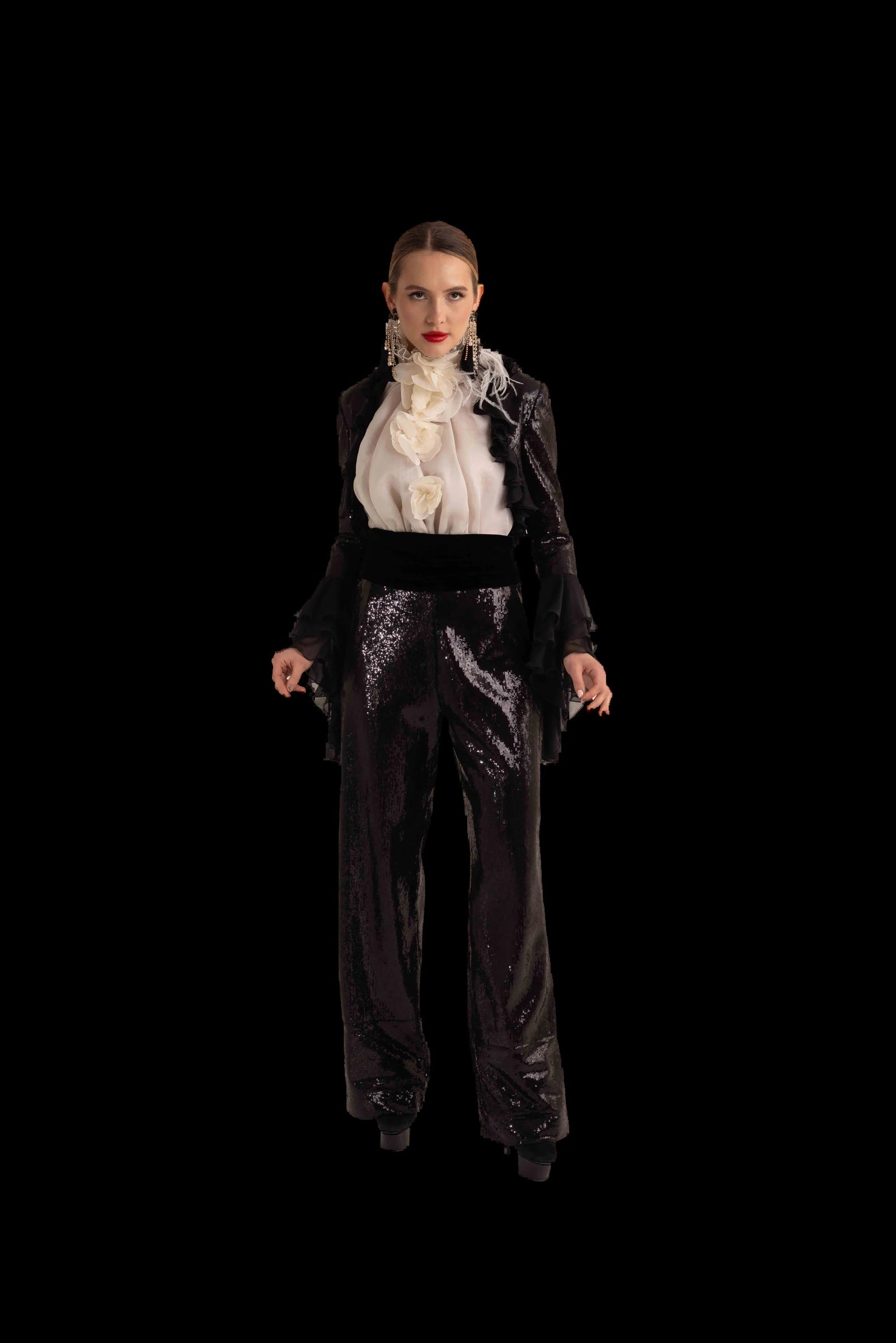 Black sequin trousers with ivory ruffled blouse and black chiffon bolero, full front view