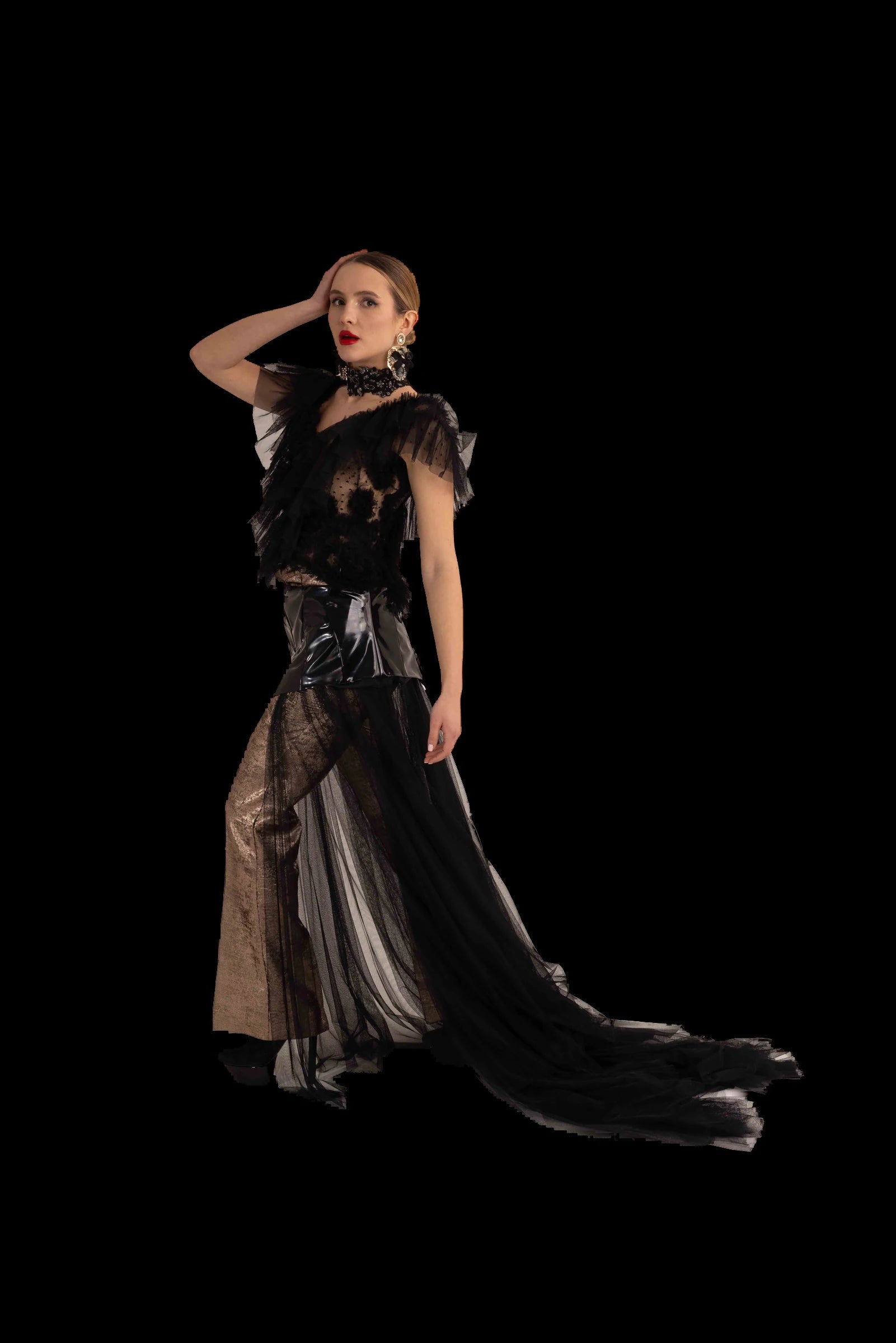 Black tulle corset gown with patent bodice, tulle train and bronze lame trousers, three-quarter view with train