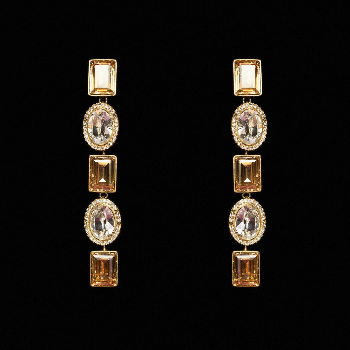Long linear drop earrings alternating amber and clear crystals in gold-tone settings