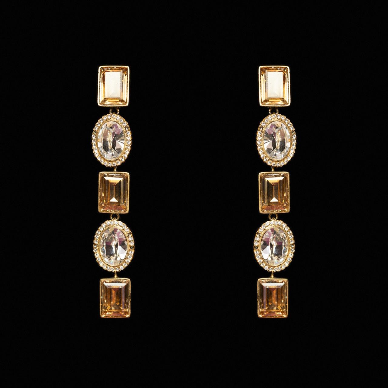 Long linear drop earrings alternating amber and clear crystals in gold-tone settings