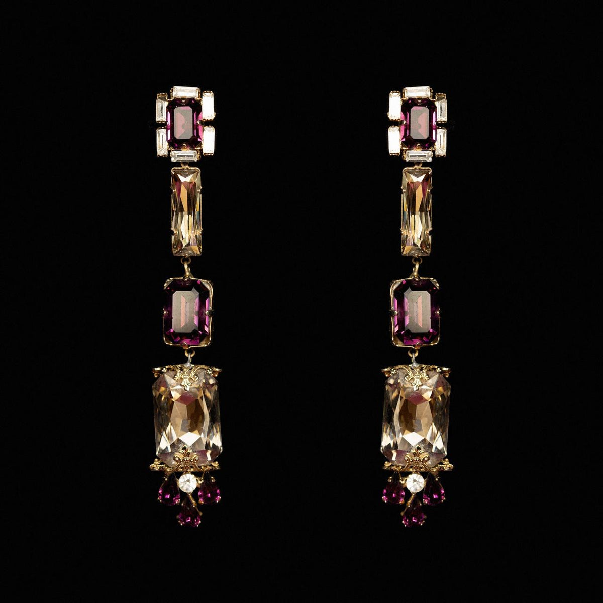 Long gold-tone drop earrings with purple and champagne crystals and a purple bead fringe