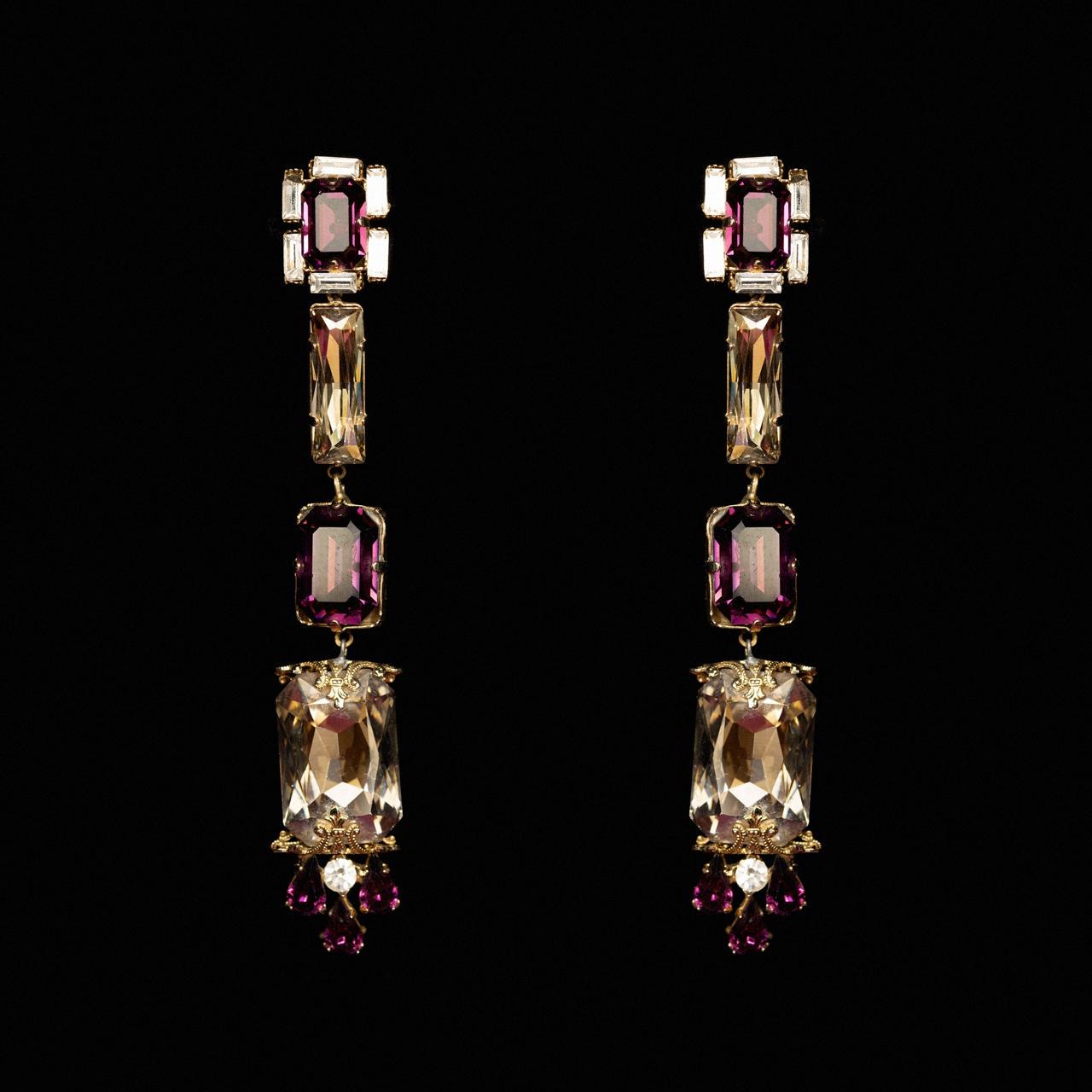 Long gold-tone drop earrings with purple and champagne crystals and a purple bead fringe