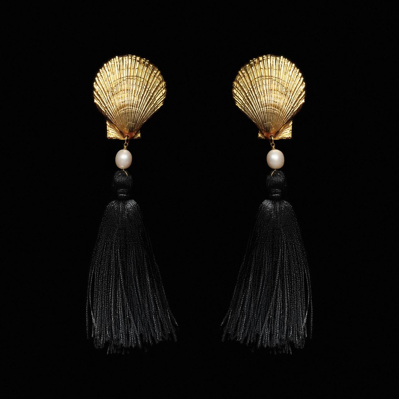 Gold-tone scallop shell earrings with a white pearl and long black silk tassels