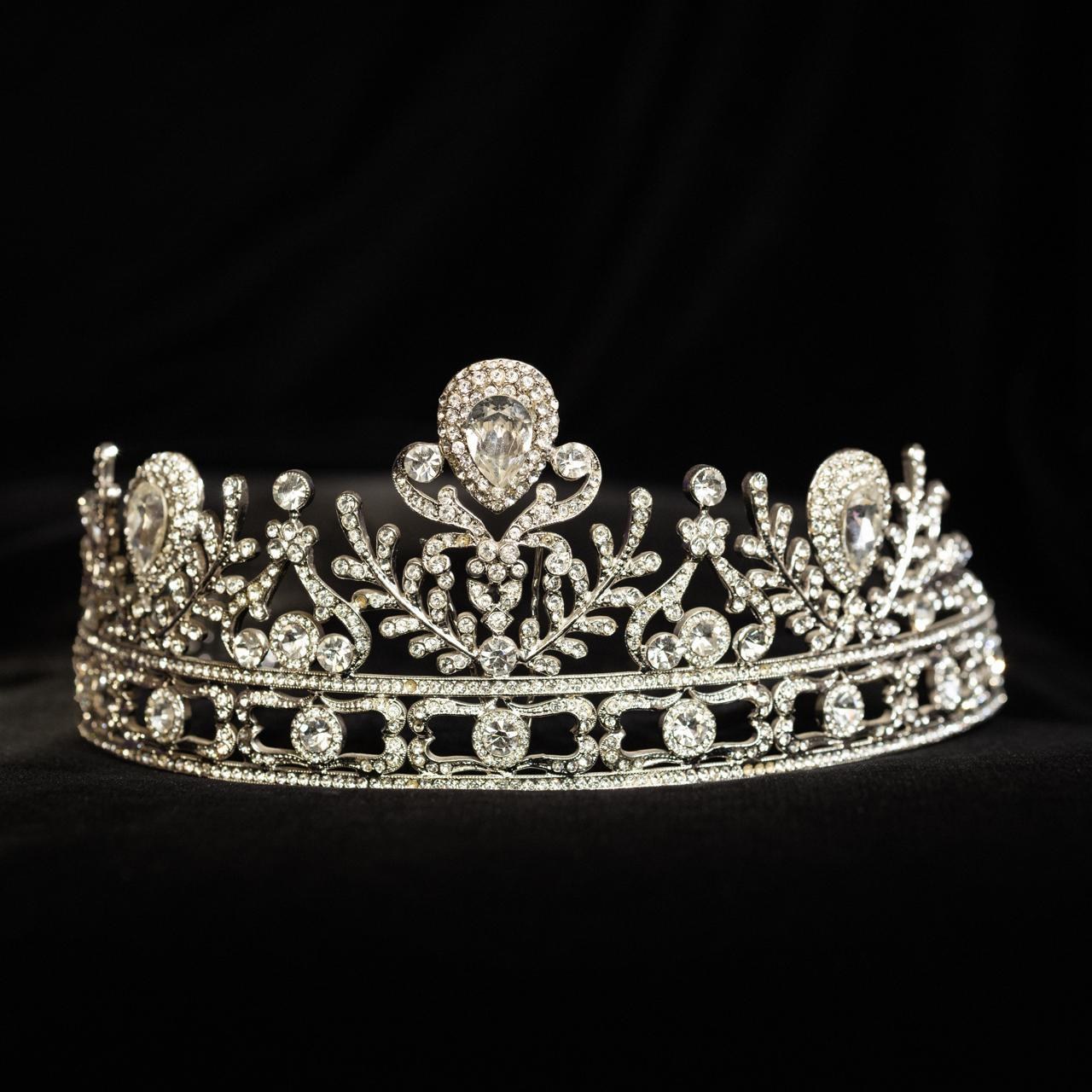 Silver-tone bridal tiara with crystal foliate scrollwork and a pear-cut centre stone