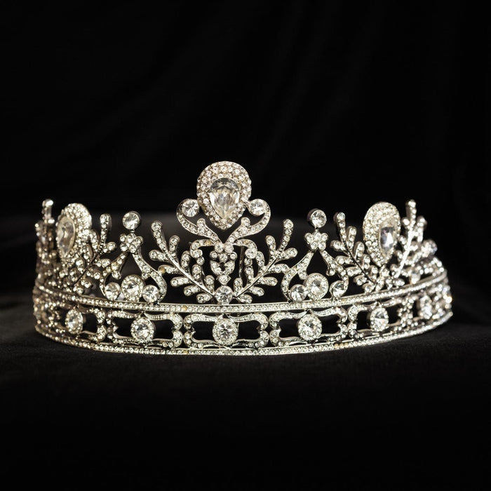 Silver-tone bridal tiara with crystal foliate scrollwork and a pear-cut centre stone