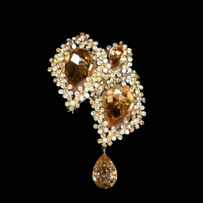 Asymmetric brooch with large champagne crystals, seed pearls and a hanging pear drop